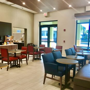 Holiday Inn Express St. Augustine - Vilano Beach - Seats for breakfast or you can take your breakfast upstairs with their handy trays - Hotels Near Me - St Augustine, Florida