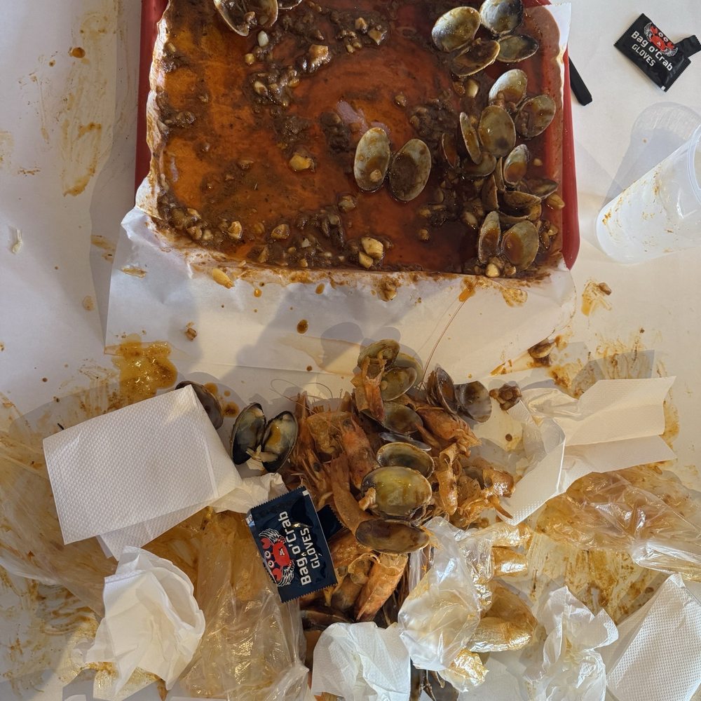 Bag O' Crab - devoured C1 Combo with ¾ lb head-off shrimp and 1 lb clams w/ a mix of the Original Cajun (medium spice) and Garlic Butter seasonings - Seafood Near Me - Berkeley, California Bag O' Crab - devoured C1 Combo with ¾ lb head-off shrimp and 1 lb clams w/ a mix of the Original Cajun (medium spice) and Garlic Butter seasonings - Seafood Near Me - Berkeley, California