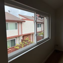 James Price Windows & Doors - Large window installation with clean installation.