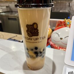 Green milk tea with boba and pudding force Green milk tea with boba and pudding force
