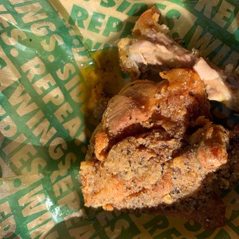 Wingstop - The size swimming in Greece over cooked dry on the inside. - Chicken Wings Near Me - El Paso, Texas