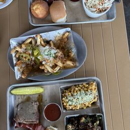 Chili Cheese Fries, Brisket Sausage Plate, Brussels, Elote, Carolina Slaw, Ml Baked Beans Chili Cheese Fries, Brisket Sausage Plate, Brussels, Elote, Carolina Slaw, Ml Baked Beans