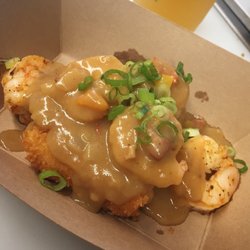 Shrimp n grit cake * creamy cheesy grit cake fried * sautéed shrimp * brown gravy