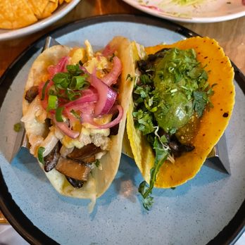 Mexicue - Midtown - cauliflower & mushroom taco and avocado and bean taco - Mexican Near Me - New York, New York Mexicue - Midtown - cauliflower & mushroom taco and avocado and bean taco - Mexican Near Me - New York, New York
