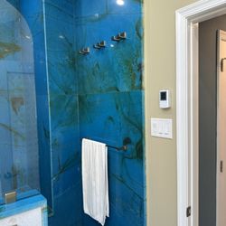 Akropolis Marble & Granite - Blue Quartzite scaling tall shower wall up to vaulted ceiling (with towel bar and hooks)