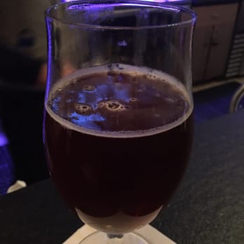 Coasters Lounge - a glass of beer on a table - Cocktail Bars Near Me - Clearwater Beach, Florida Coasters Lounge - a glass of beer on a table - Cocktail Bars Near Me - Clearwater Beach, Florida