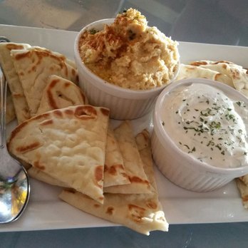 Taverna Manos - Garlic Hummus & Tzatziki Dips with Pita wedges - Mediterranean Near Me - Crystal River, Florida Taverna Manos - Garlic Hummus & Tzatziki Dips with Pita wedges - Mediterranean Near Me - Crystal River, Florida