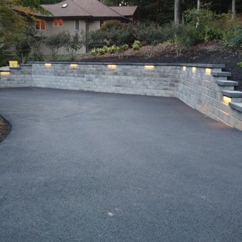 Oasis Landscape Group - a driveway with a retaining wall and steps - Landscaping Near Me - Annapolis, Maryland