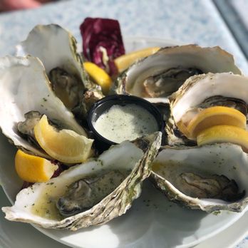 Tognazzini's Dockside - Smoked oysters with garlic butter! - Seafood Near Me - Morro Bay, California Tognazzini's Dockside - Smoked oysters with garlic butter! - Seafood Near Me - Morro Bay, California