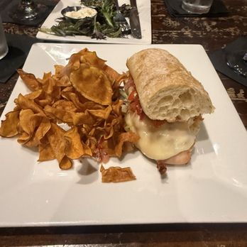 CorkScrew Bar & Grille - chimichurri chicken sandwich with house sweet potato chips - Bars Near Me - New Smyrna Beach, Florida CorkScrew Bar & Grille - chimichurri chicken sandwich with house sweet potato chips - Bars Near Me - New Smyrna Beach, Florida