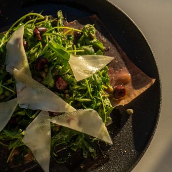 Botanya Restaurant - a plate of food on a table - Spanish Near Me - Richmond, Virginia