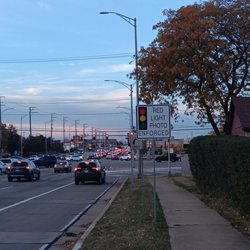 Hoffman Estates Police Department - This photo here shows how the photo enforced sign is 7 to 8 feet high as opposed to being eye level, where you can see it at night.