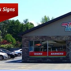 On The Mark Signs