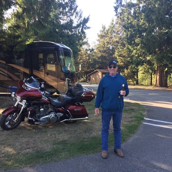 North Whidbey Rv Park - Karl admiring a neighbors bike - RV Parks Near Me - Oak Harbor, Washington