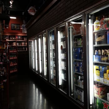 Downtown Liquor - a row of refrigerators in a store - Beer, Wine & Spirits Near Me - Cleveland, Ohio Downtown Liquor - a row of refrigerators in a store - Beer, Wine & Spirits Near Me - Cleveland, Ohio