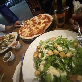 La Malquerida - Caesar salad with pepperoni pizza. - Mexican Near Me - Tulum, ROO