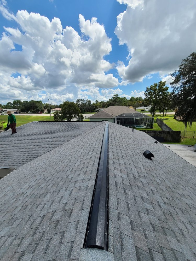 Slide of SolyMar Roofing