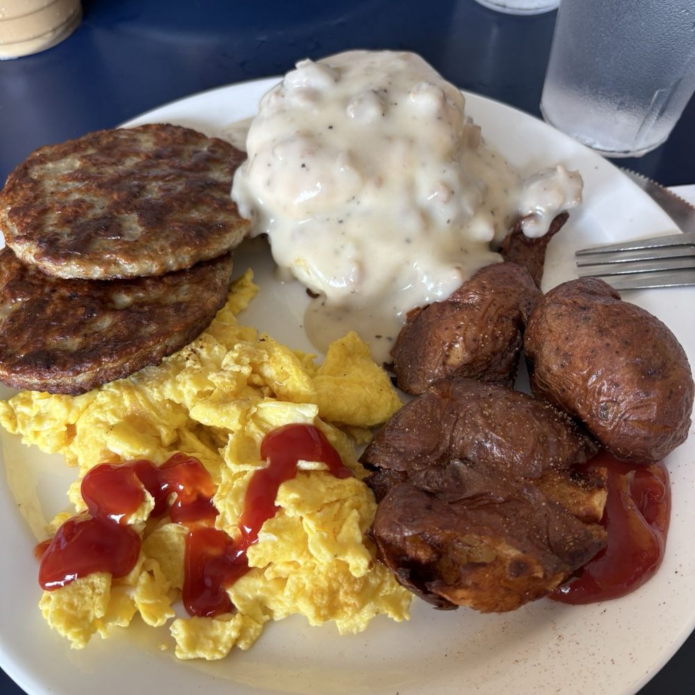 Biscuits and gravy, 2 eggs, home fries and a side of sausage Biscuits and gravy, 2 eggs, home fries and a side of sausage