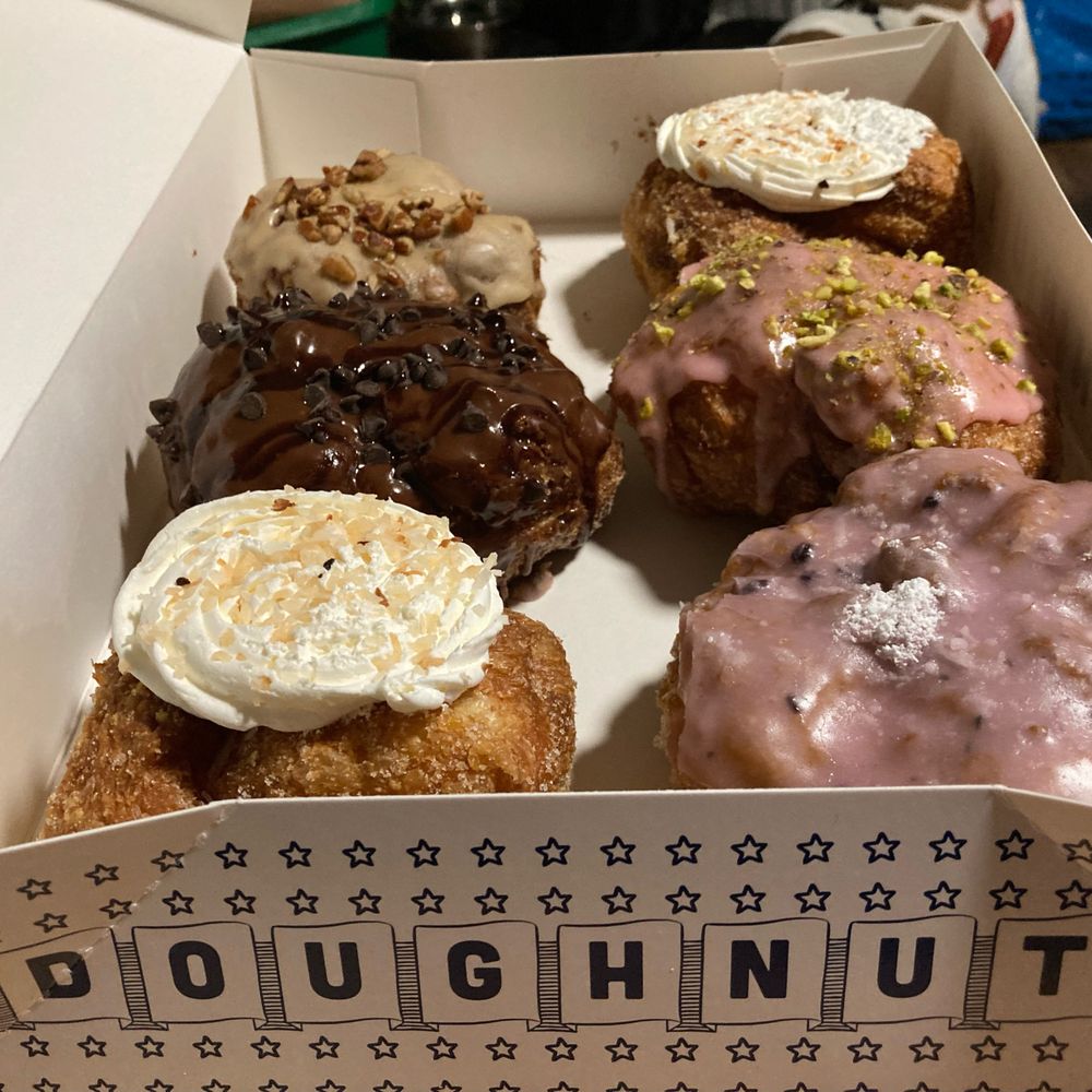 Parlor Doughnuts - On left are coconut cream, chocolate chocolate, maple bacon. Right are blueberry hill, raspberry pistachio, and coconut cream. - Donuts Near Me - Knoxvile, Tennessee Parlor Doughnuts - On left are coconut cream, chocolate chocolate, maple bacon. Right are blueberry hill, raspberry pistachio, and coconut cream. - Donuts Near Me - Knoxvile, Tennessee