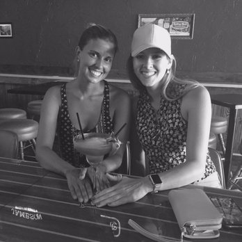 The Tamiami - two women sitting at a table - Bars Near Me - Saint Petersburg, Florida The Tamiami - two women sitting at a table - Bars Near Me - Saint Petersburg, Florida