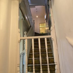 Daisy Green - Stairs up to entrance level.  Quite the acrobatic feat for the staff bringing coffees and other drinks down the stairs.