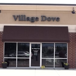 The Village Dove - Village Dove. Avalon Crossing. E 71st and Binford. July 2011.