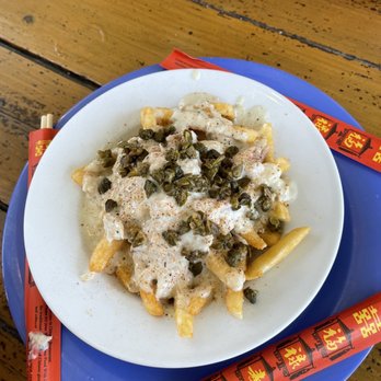 Sunset Grille - Crabby Fries . Fries pull over with crabs soup. - Seafood Near Me - Saint Augustine, Florida Sunset Grille - Crabby Fries . Fries pull over with crabs soup. - Seafood Near Me - Saint Augustine, Florida