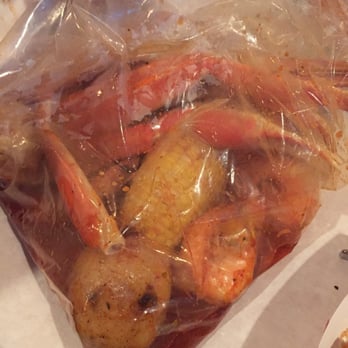Holly Crab - The bag of seafood treasures - Seafood Near Me - Boston, Massachusetts Holly Crab - The bag of seafood treasures - Seafood Near Me - Boston, Massachusetts