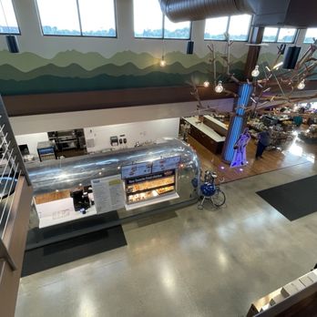 Blue Badger Bar & Grill - The mezzanine has a great view of the airstream trailer. Place your order down there or up top. - American Near Me - Sturtevant, Wisconsin