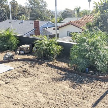 Elias Landscape and Masonry - Palms moved and weed barrier being placed - Masonry/Concrete Near Me - Oceanside, California Elias Landscape and Masonry - Palms moved and weed barrier being placed - Masonry/Concrete Near Me - Oceanside, California
