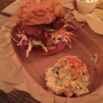 Yard Bar - Yard Bird sandwich. Perfectly fried chicken strips, bright coleslaw and spicy mayo! Amazing. - Bars Near Me - Austin, Texas