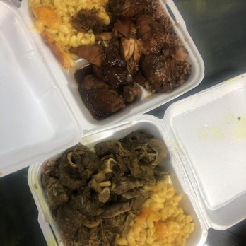 Irie Nation Restaurant & Bar - Curry goat, rice & beans, Mac n cheese (bottom) - Caribbean Near Me - Charlotte, North Carolina