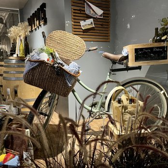 Uncork, Unwind - a bicycle in a store - Wine Bars Near Me - Des Plaines, Illinois
