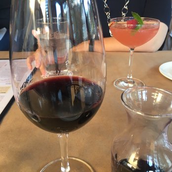 Taverna - Wine and Austin cocktail. Austin cocktail is pretty tasty. Not too sweet. - Italian Near Me - Austin, Texas Taverna - Wine and Austin cocktail. Austin cocktail is pretty tasty. Not too sweet. - Italian Near Me - Austin, Texas
