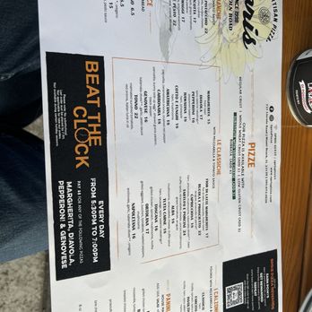 Spris Artisan Pizza - Lincoln Road - Menu - A menu from Spris Artisan Pizza located on Lincoln Road, Miami Beach, FL, displaying various pizza options including Margherita, Quattro Formaggi, and Vegan Pizza, with details on ingredients and prices. The menu includes sections for different pizza styles, such as Le Focacce and Pizza Bianca, and features a QR code for online ordering. It also highlights the restaurant's operating hours and promotional messages, with a focus on fresh ingredients and diverse toppings. - Pizza Near Me - Miami Beach, Florida