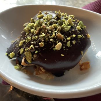 VINIA Wine & Kitchen - Butternut squash panna cotta with cocoa sauce and crushed pistachios and toasted coconut - Wine Bars Near Me - Winter Park, Florida VINIA Wine & Kitchen - Butternut squash panna cotta with cocoa sauce and crushed pistachios and toasted coconut - Wine Bars Near Me - Winter Park, Florida