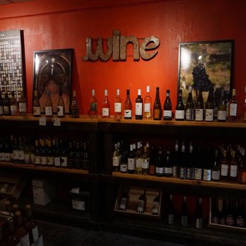 Birmingham Wine - bottles of wine on shelves in a wine shop - Beer, Wine & Spirits Near Me - Birmingham, Michigan