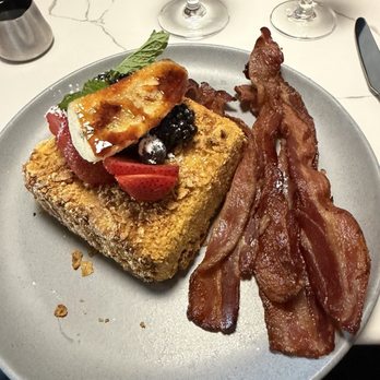 Barrel & Derrick - Crunchy French toast with a side of bacon. I tried to eat it all, but it was so filling. The bacon was epic. - Breakfast & Brunch Near Me - Odessa, Texas