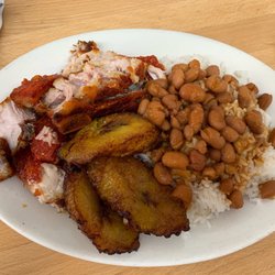 Dominican Restaurant - Chicharron with a side of plantains and red beans and rice