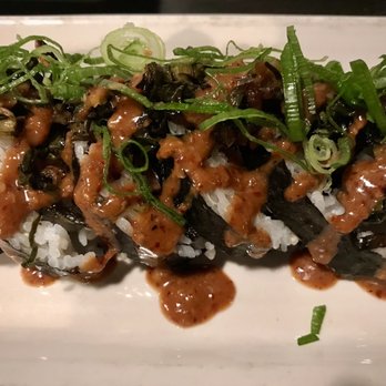 The Plot - Spamless masubi maki roll topped with charred garden greens, sweet n spicy citrus garlic aioli. $14.50. Very tasty, not well rolled. - Vegan Near Me - Oceanside, California