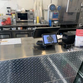 Saiguette - a tablet on a counter in a restaurant - Vietnamese Near Me - Manhattan, New York Saiguette - a tablet on a counter in a restaurant - Vietnamese Near Me - Manhattan, New York