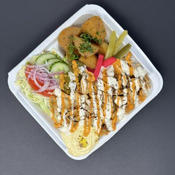 Viva Shawarma - a plate of food in a styrofoam container - Mediterranean Near Me - North York, Ontario Viva Shawarma - a plate of food in a styrofoam container - Mediterranean Near Me - North York, Ontario