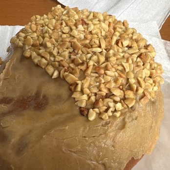 Voodoo Doughnut - Forget the name but it has peanut butter, nuts, and jam inside. - Donuts Near Me - San Antonio, Texas