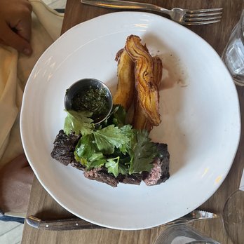 Martina - Bavette steak with potato churros - Argentine Near Me - Minneapolis, Minnesota Martina - Bavette steak with potato churros - Argentine Near Me - Minneapolis, Minnesota