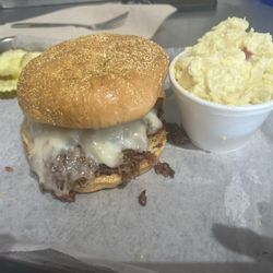 Oklahoma Joe's BBQ and Catering - 'The Q' brisket sandwich. Potato salad