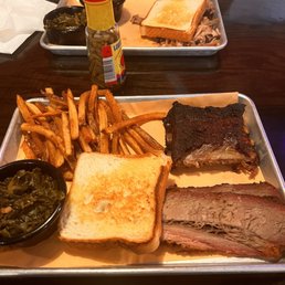 Combo with ribs, brisket and collards.