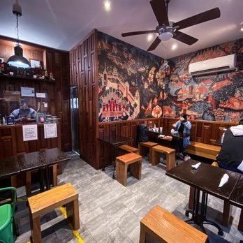 Boon Chu Thai Place - a man sitting at a table - Thai Near Me - Elmhurst, New York Boon Chu Thai Place - a man sitting at a table - Thai Near Me - Elmhurst, New York