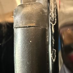 Damaged door seal and door edge scraped.