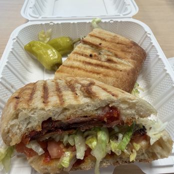 Campini's Italian Deli - PLT Sandwich: Sliced pancetta, sun-dried tomato pesto, lettuce and tomatoes on a ciabatta roll and toasted in a panini press - Delis Near Me - Temecula, California