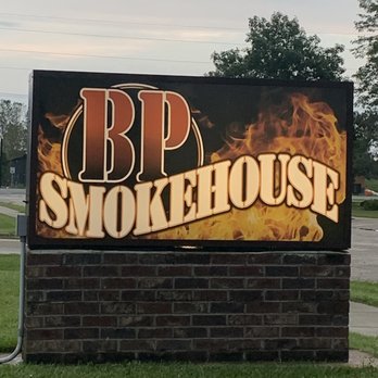BP Smokehouse - smoke coming out of the sign - Barbeque Near Me - Tomah, Wisconsin
